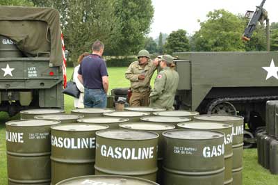 Members of the 514th QM Truck Regiment show their equipment to visitors to the fte 