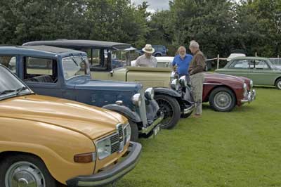 A moment to examine one of the vintage cars on show 