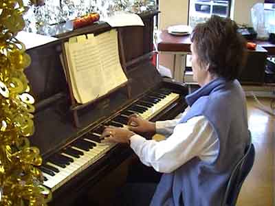 Sue Sykes on the piano