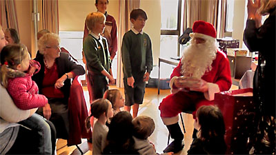 Father Christmas got down to work handing out presents