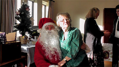 Our punch-maker, Eira Cray, took her turn on Santa's knee