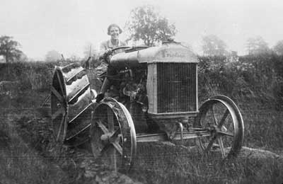 Ena Westbrook on her tractor 1930s 